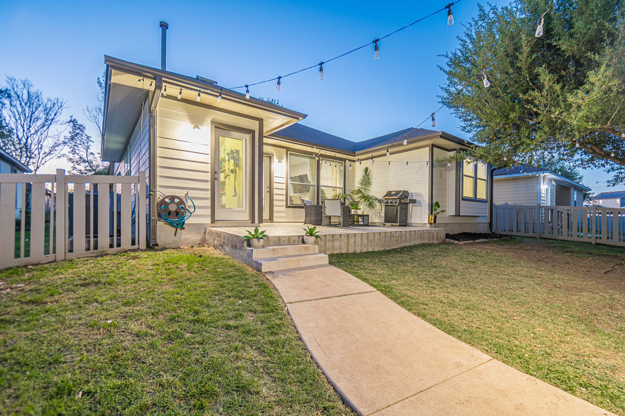 1031 Powell Kyle, TX 78640 - Photo 31 of 40 Twilight View of back of house