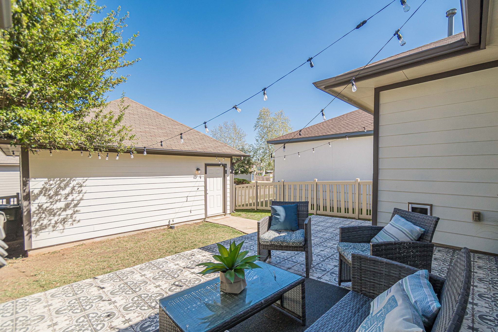 1031 Powell Kyle, TX 78640 - Photo 32 of 40 Fenced backyard with outdoor furniture and a patio area