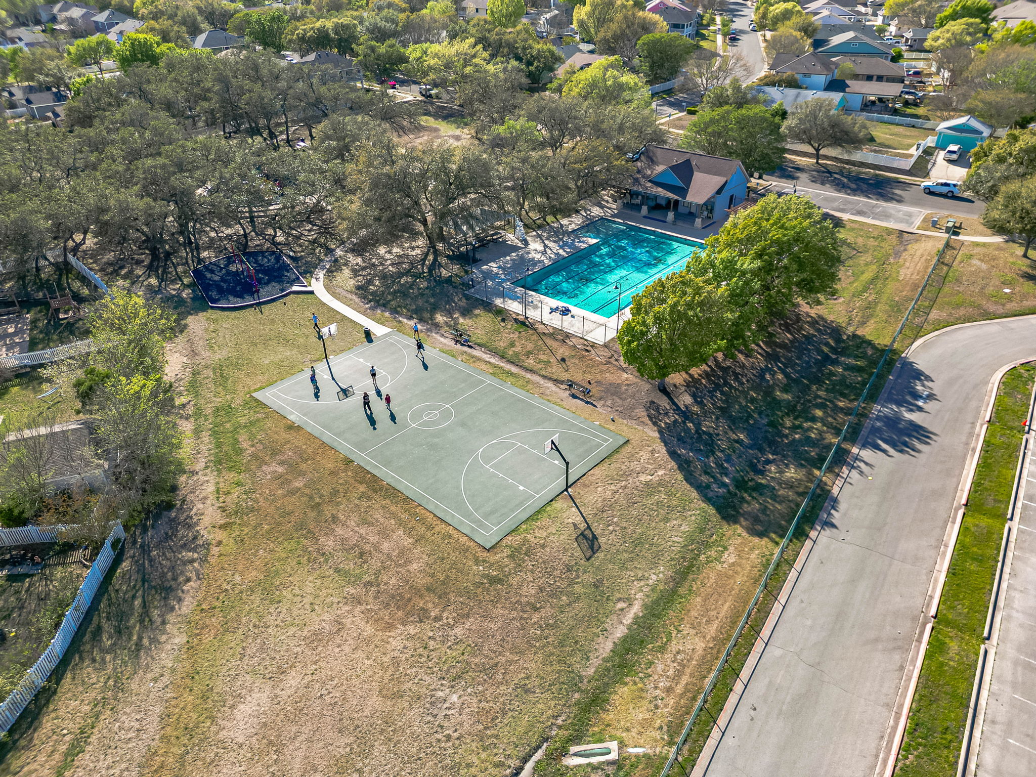 1031 Powell Kyle, TX 78640 - Photo 36 of 40 Lap pool and basketball court