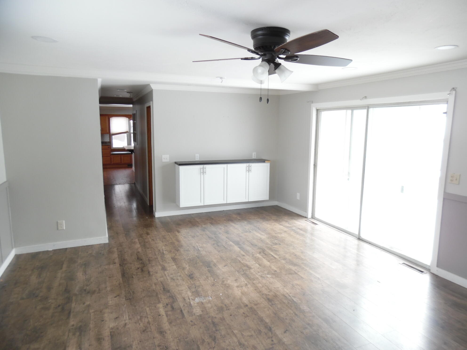 813 West Division Road De Motte, IN 46310 - Photo 10 of 20 wooden floor in an empty room with a window