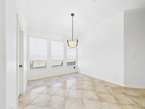 a view of an empty room with window
