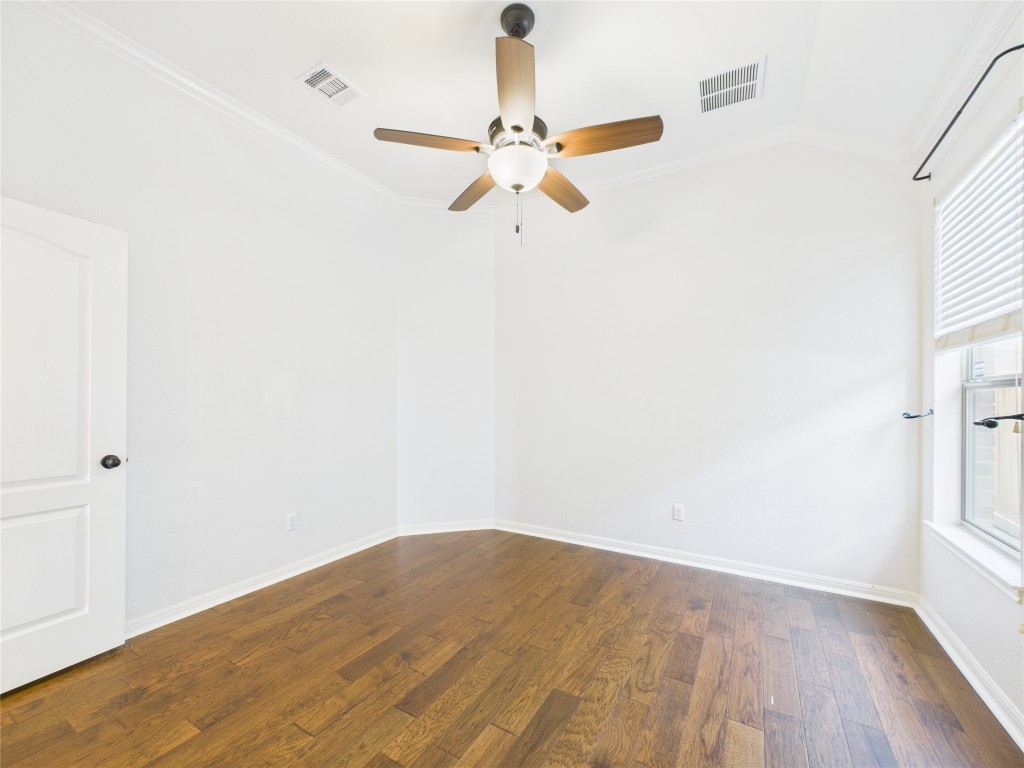 2624 Outlook Ridge Loop Leander, TX 78641 - Photo 22 of 39 a view of empty room with wooden floor