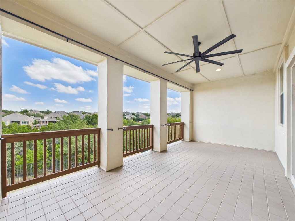 2624 Outlook Ridge Loop Leander, TX 78641 - Photo 31 of 39 a view of a porch with wooden floor and fence