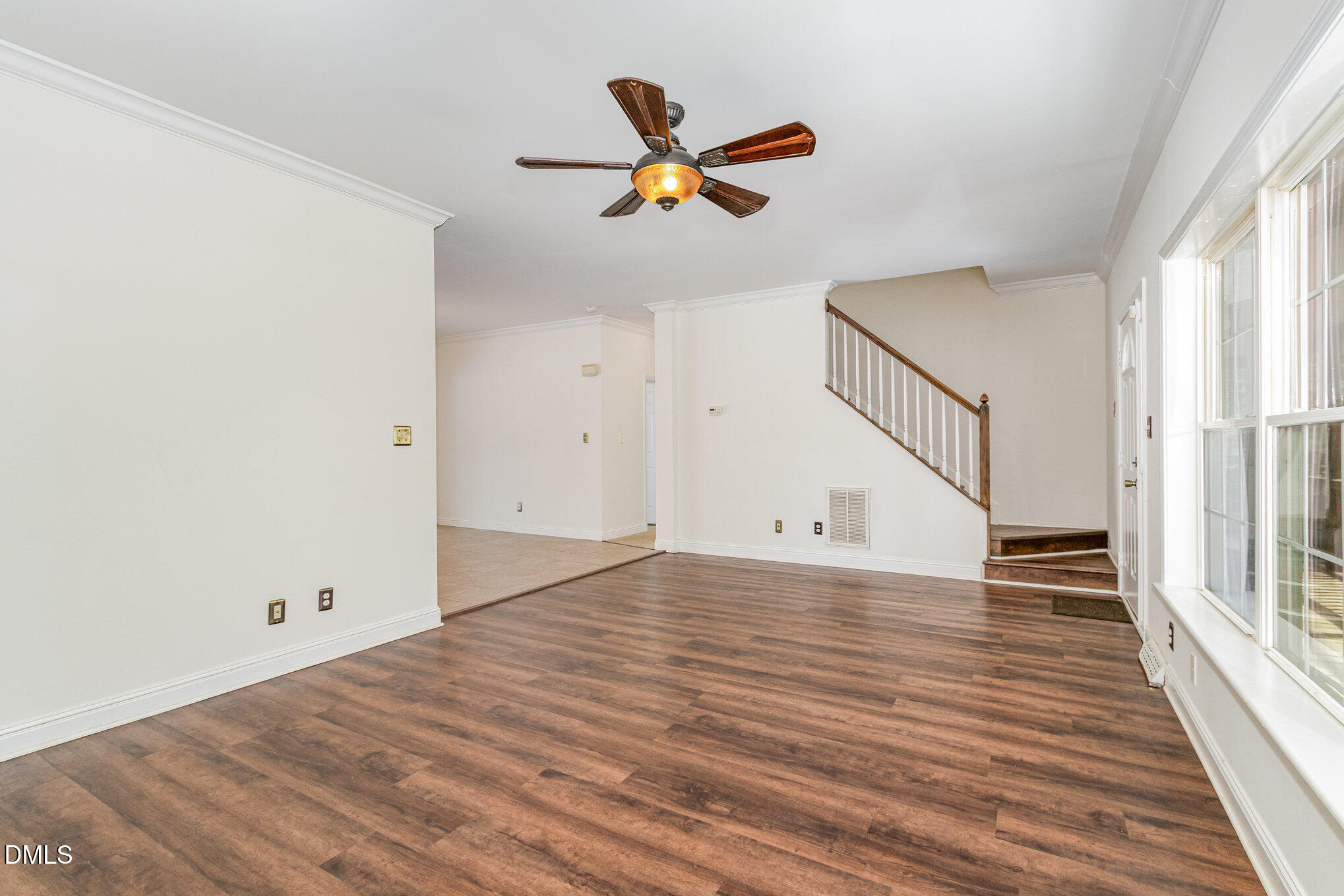 1176 Stoney Mountain Road Rougemont, NC 27572 - Photo 12 of 44 a view of an empty room with wooden floor and a window
