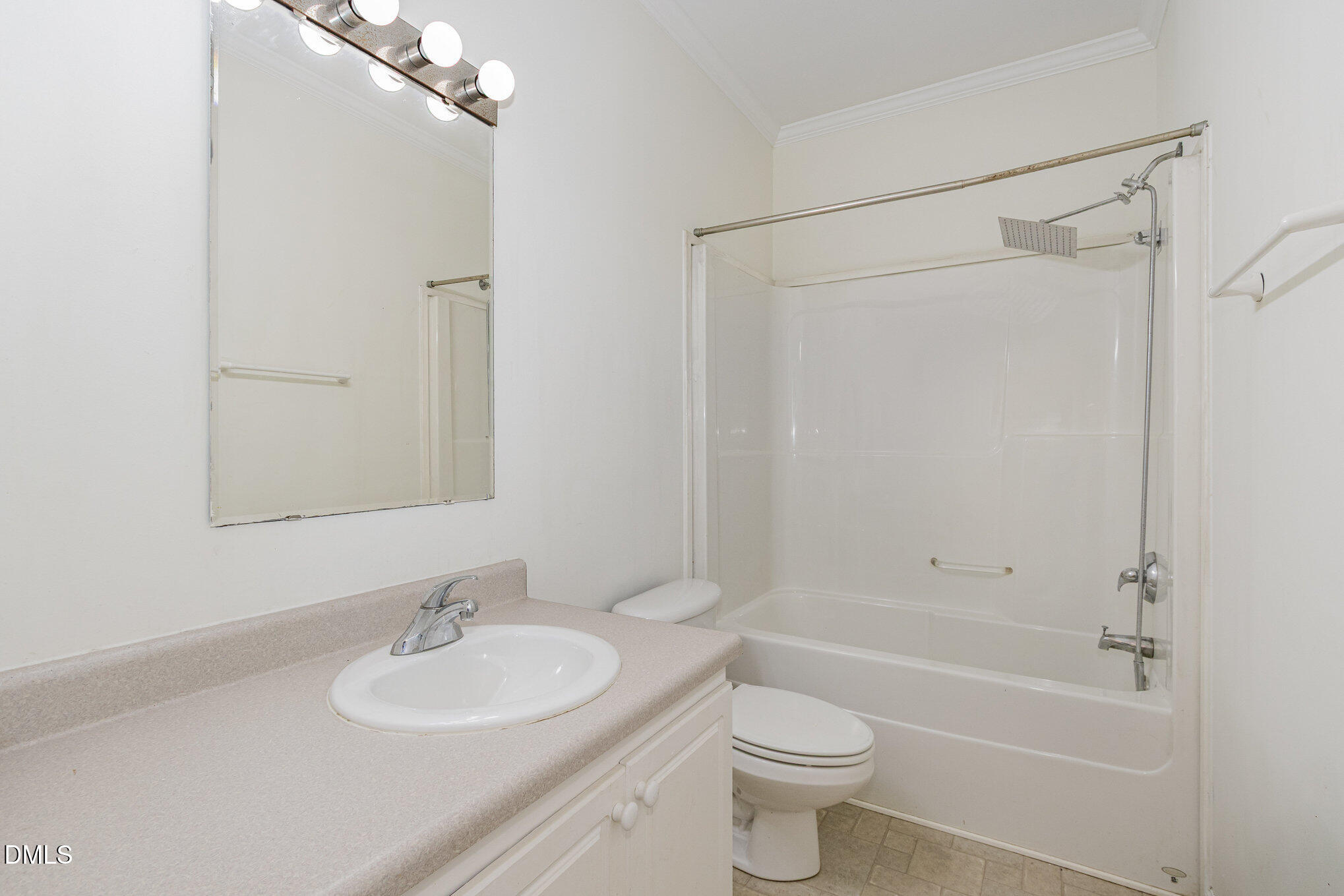 1176 Stoney Mountain Road Rougemont, NC 27572 - Photo 26 of 44 a bathroom with a sink a toilet and shower