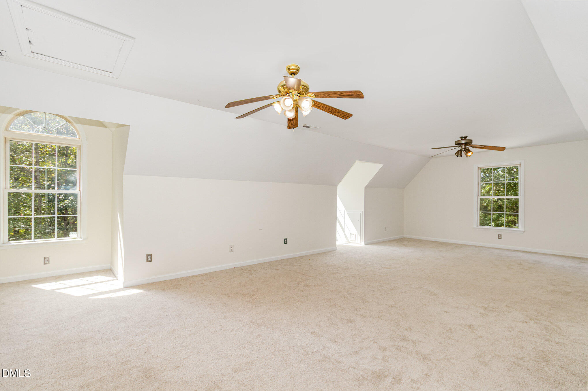 1176 Stoney Mountain Road Rougemont, NC 27572 - Photo 29 of 44 an empty room with windows and fan