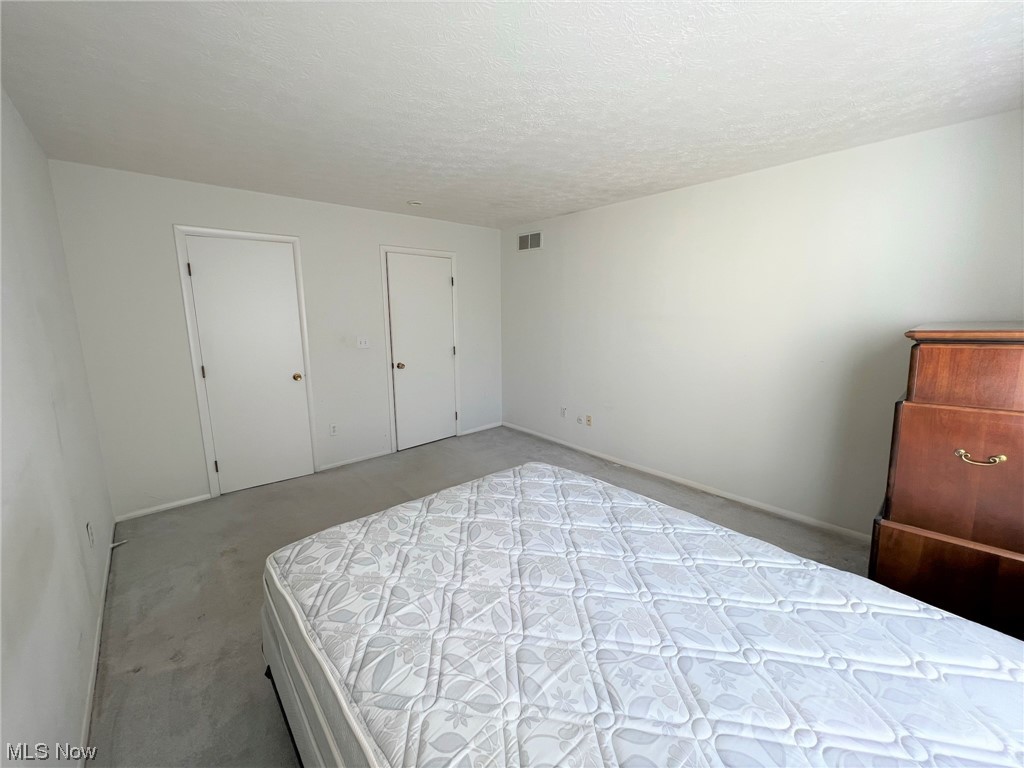 1096 Hampton Ridge Drive Akron, OH 44313 - Photo 24 of 32 2nd bedroom view towards closet and entrance