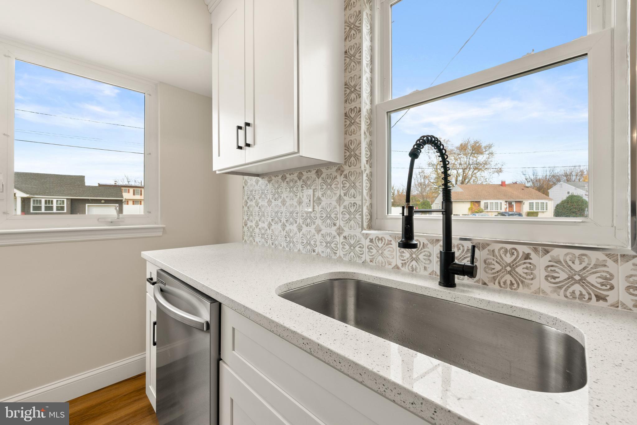 23 Hastings Road Hamilton, NJ 08620 - Photo 14 of 35 a close view of sink and tap