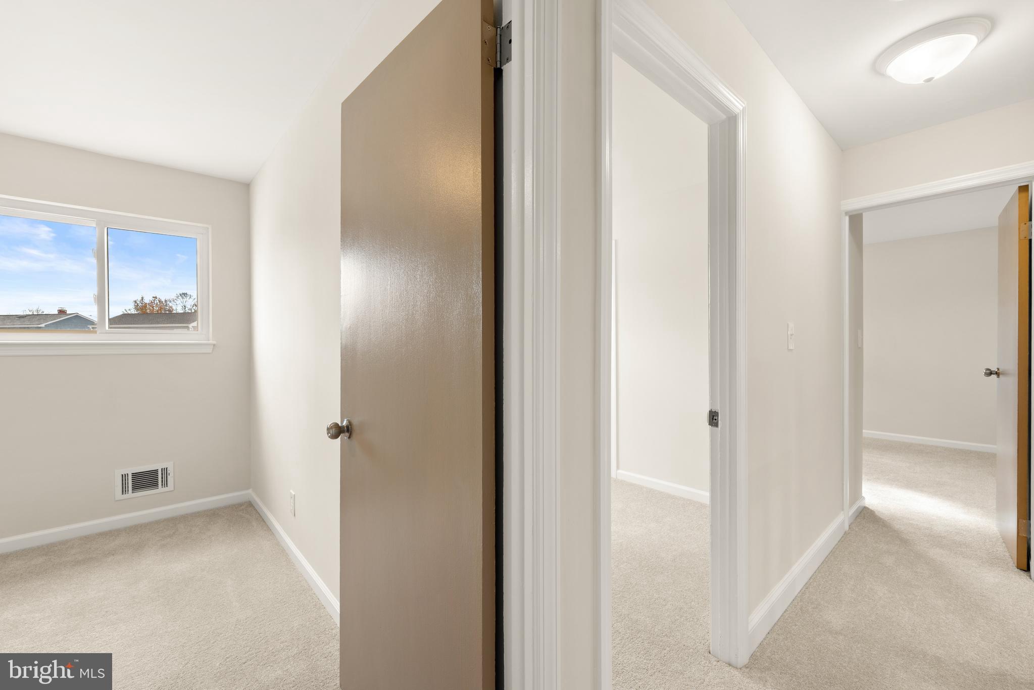 23 Hastings Road Hamilton, NJ 08620 - Photo 16 of 35 a view of a hallway with closet area