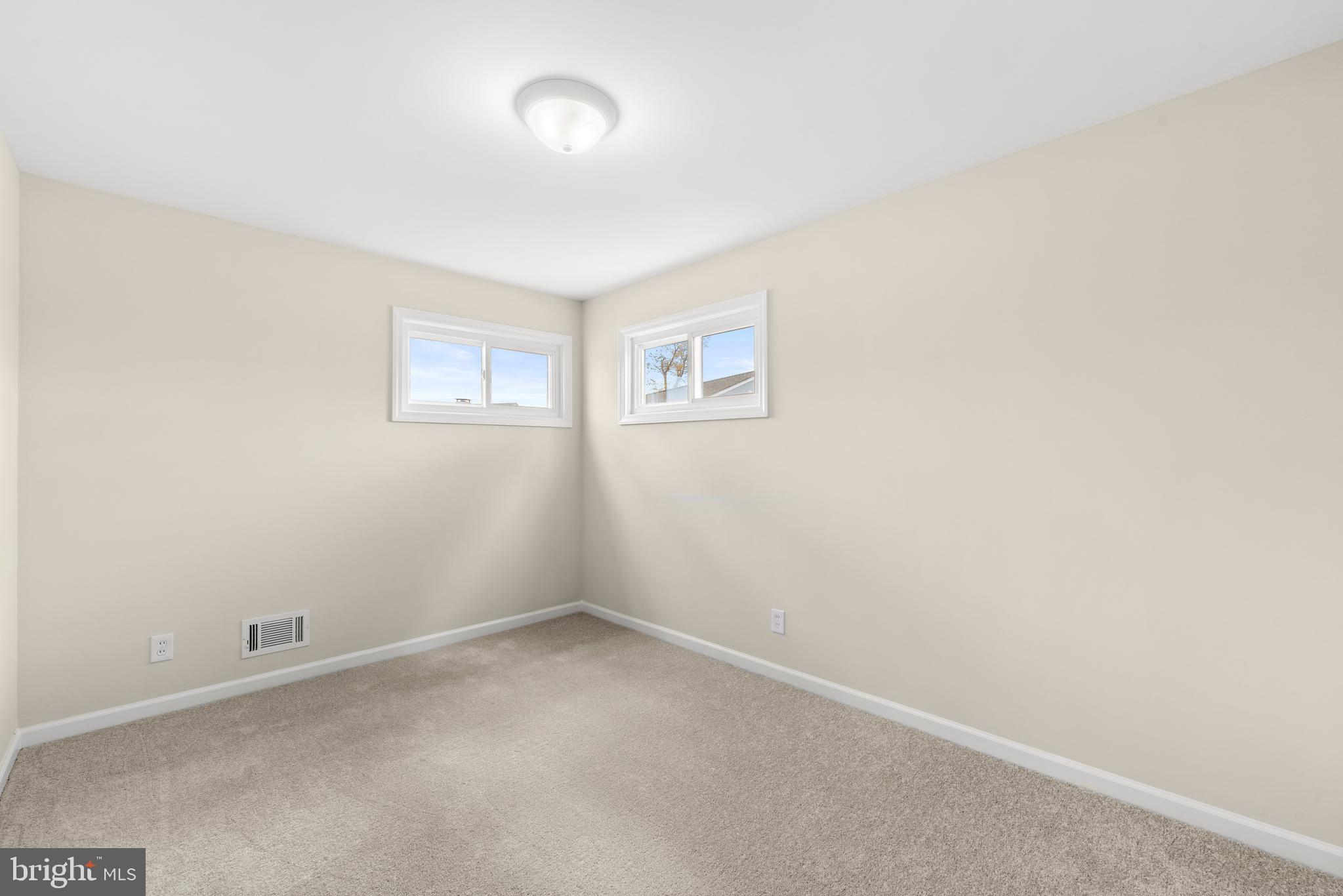 23 Hastings Road Hamilton, NJ 08620 - Photo 18 of 35 an empty room with a empty space and window