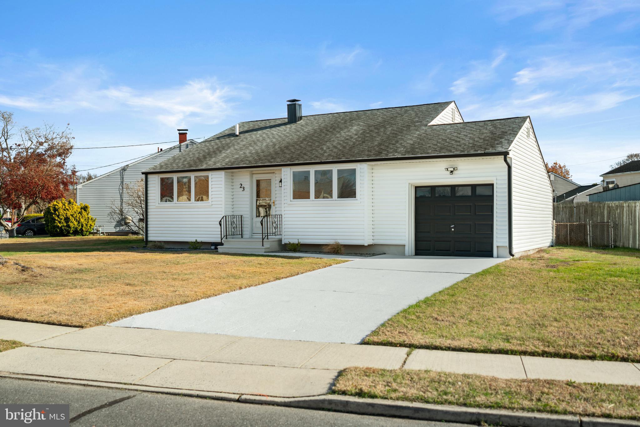 23 Hastings Road Hamilton, NJ 08620 - Photo 2 of 35 a front view of a house with a yard
