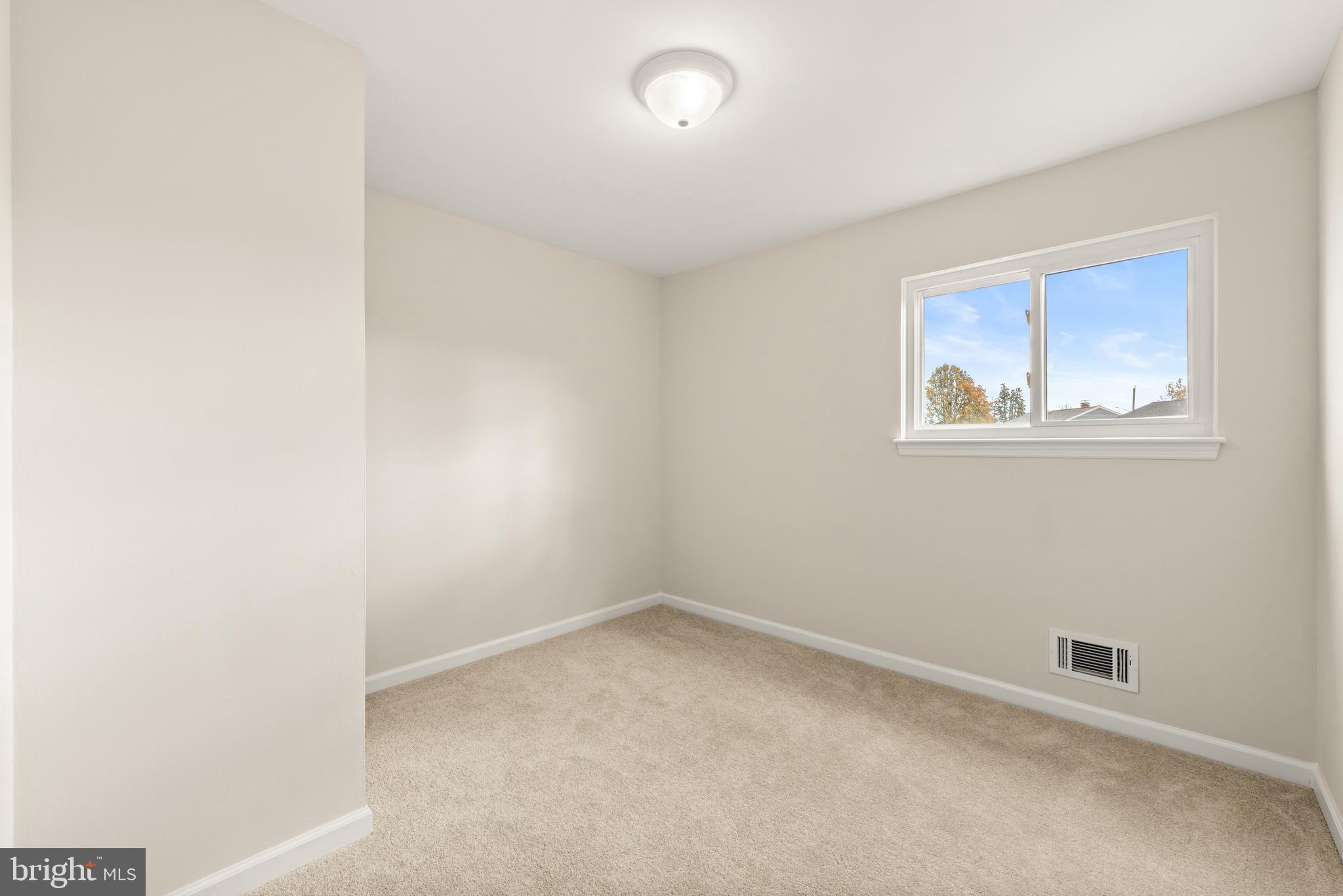 23 Hastings Road Hamilton, NJ 08620 - Photo 21 of 35 an empty room with a window