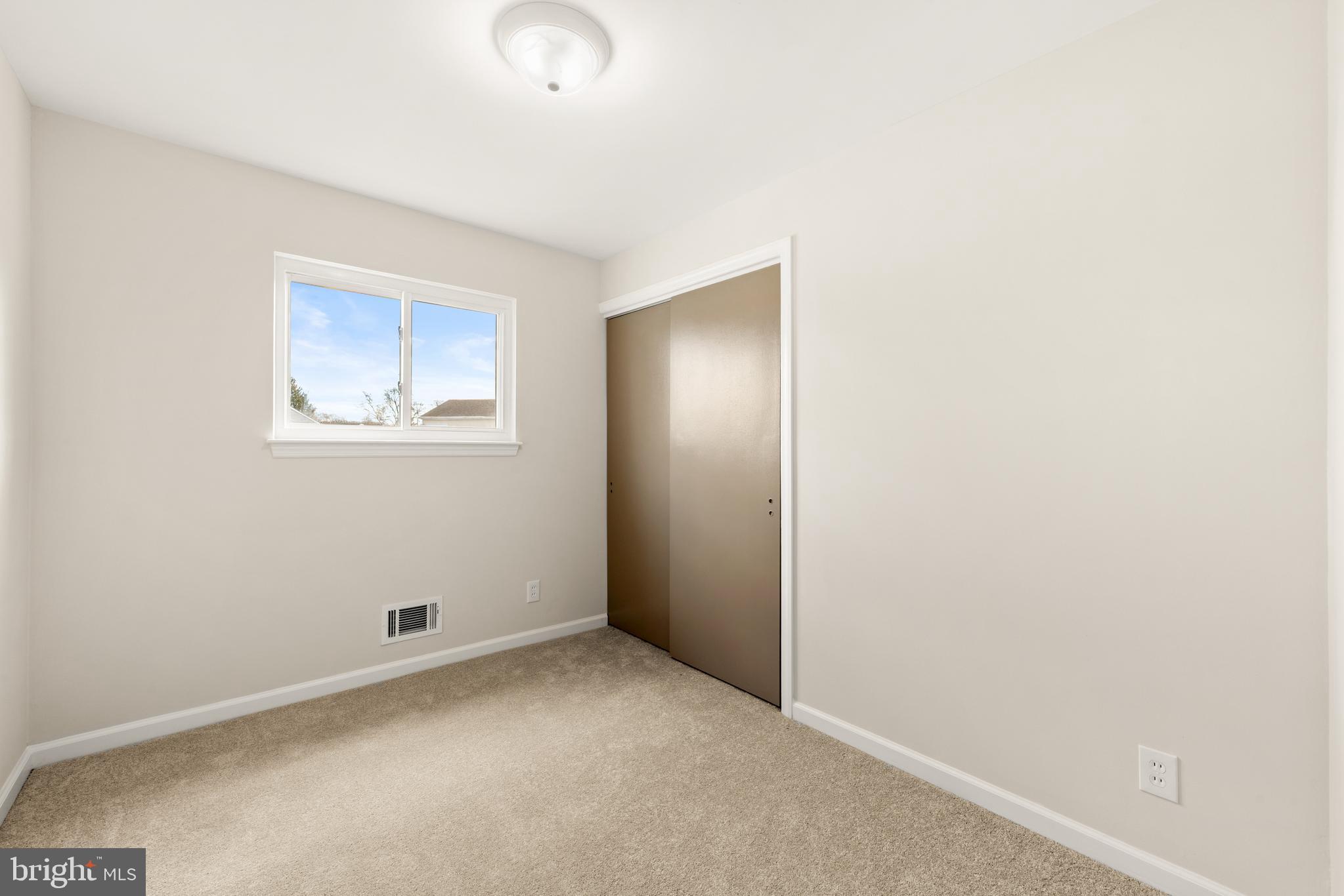 23 Hastings Road Hamilton, NJ 08620 - Photo 23 of 35 an empty room with windows