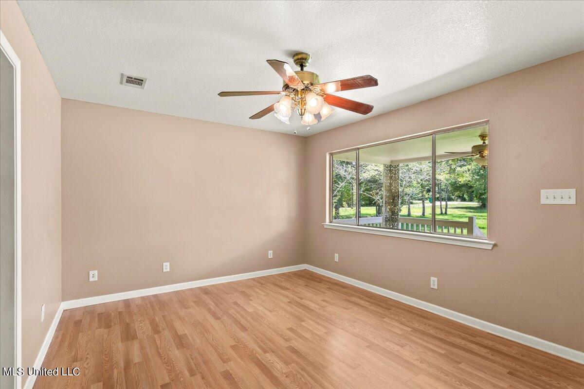 26290 Wolf Creek Road Kiln, MS 39556 - Photo 11 of 40 09-Living Room