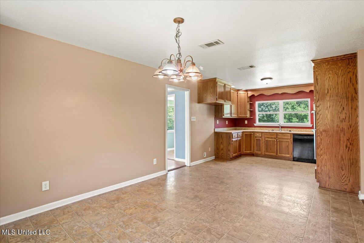 26290 Wolf Creek Road Kiln, MS 39556 - Photo 17 of 40 15-Dining to Kitchen