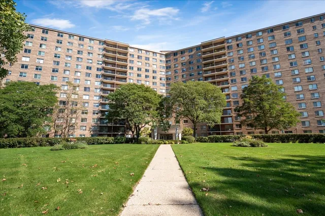 a view of a building with a yard
