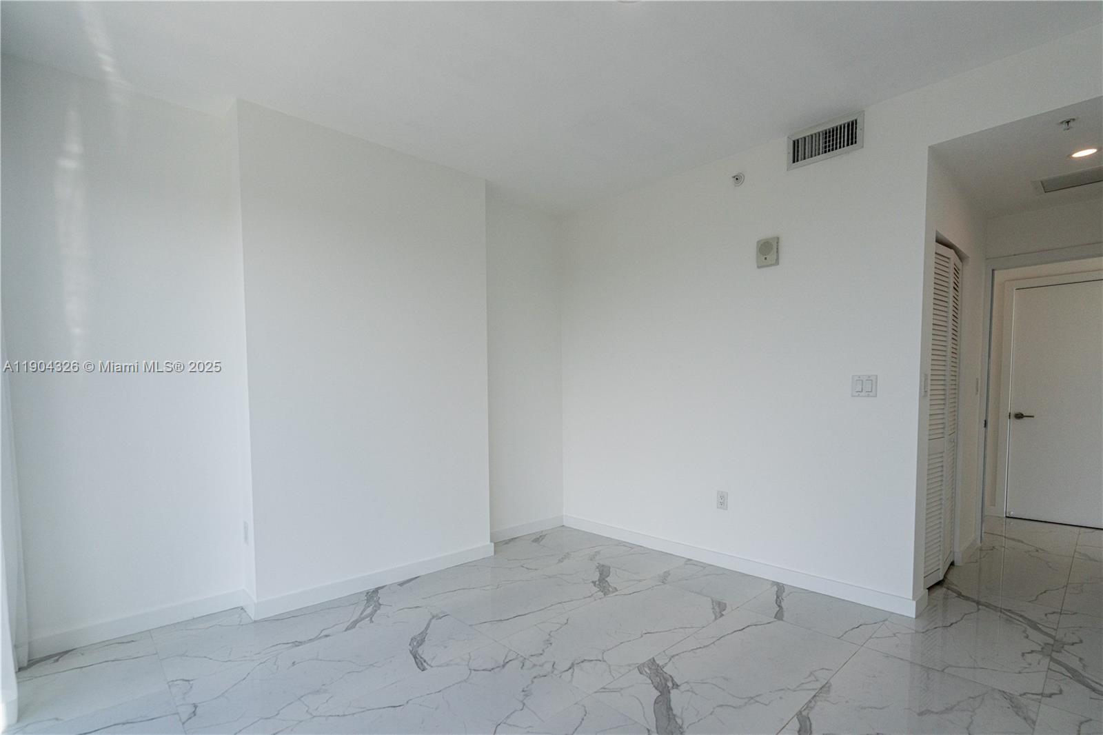8425 Crespi Boulevard, Unit 404 Miami Beach, FL 33141 - Photo 12 of 21 a view of an empty room