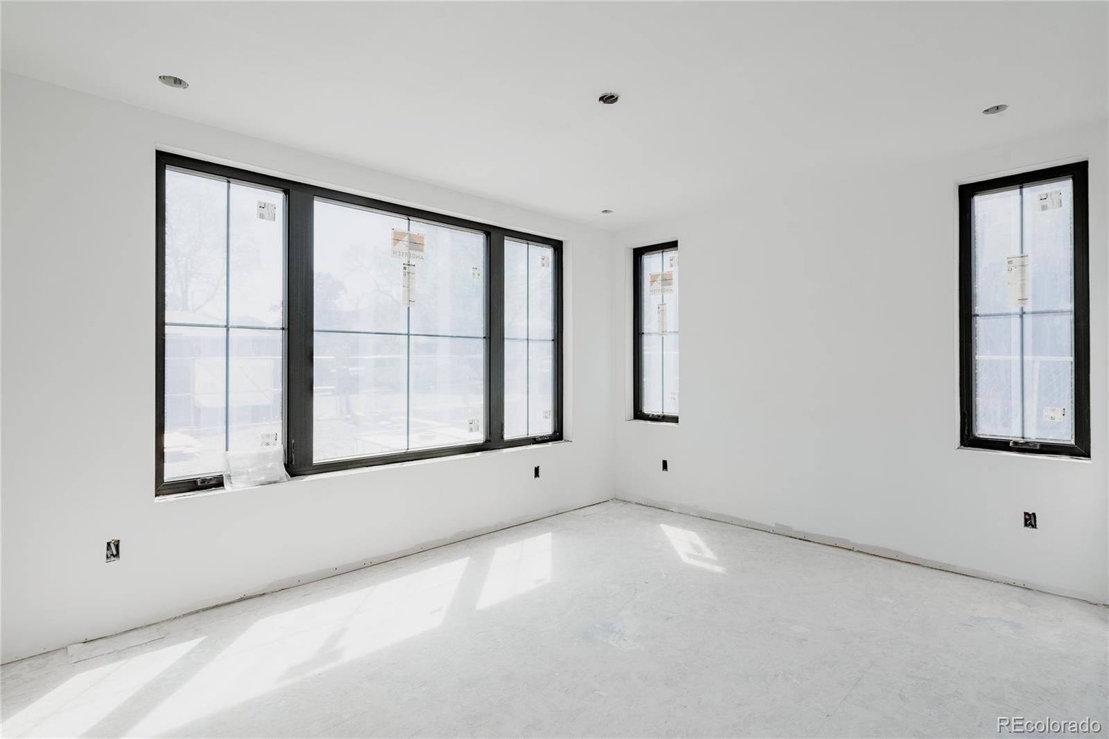 1935 Meade Street Denver, CO 80204 - Photo 11 of 43 a view of an empty room with a window