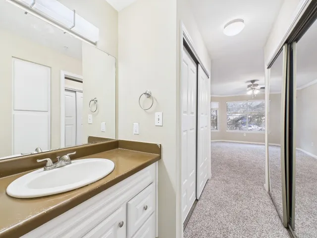 a bathroom with a toilet and a bathtub