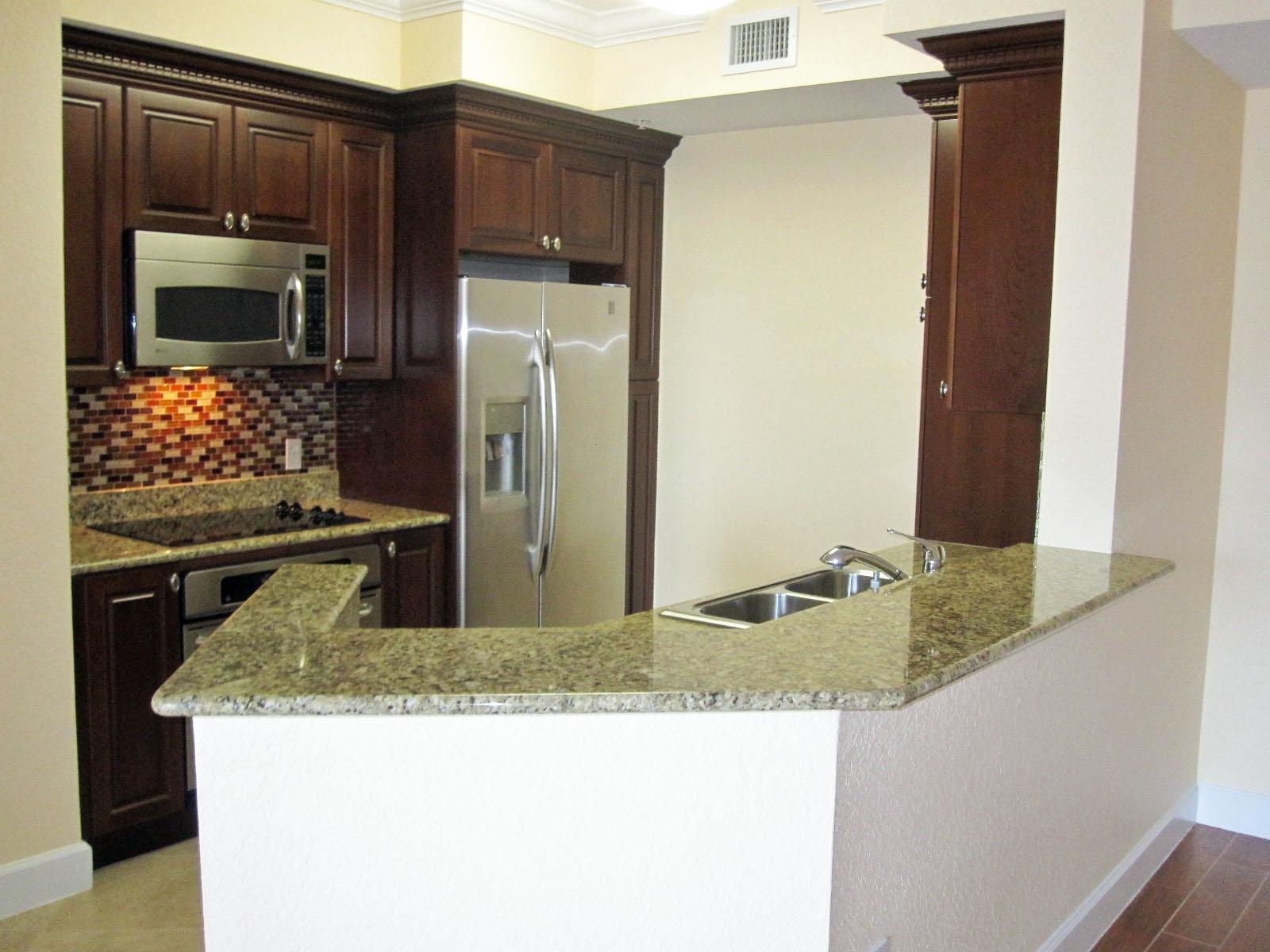 1690 Renaissance Commons Boulevard, Unit 1629 Boynton Beach, FL 33426 - Photo 4 of 18 Kitchen
