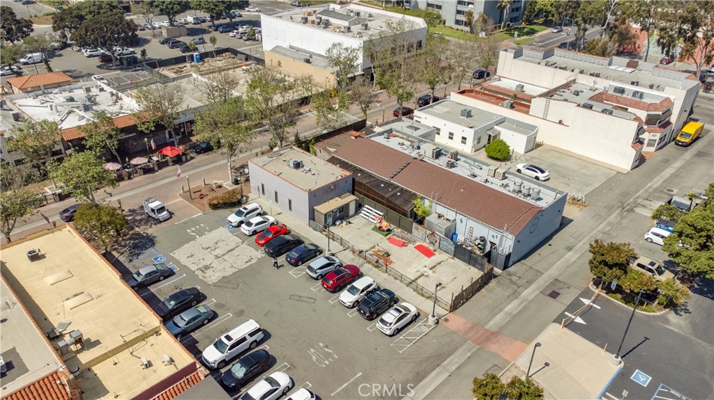12908 Main Street Garden Grove, CA 92840 - Photo 11 of 18 an aerial view of residential houses with outdoor space