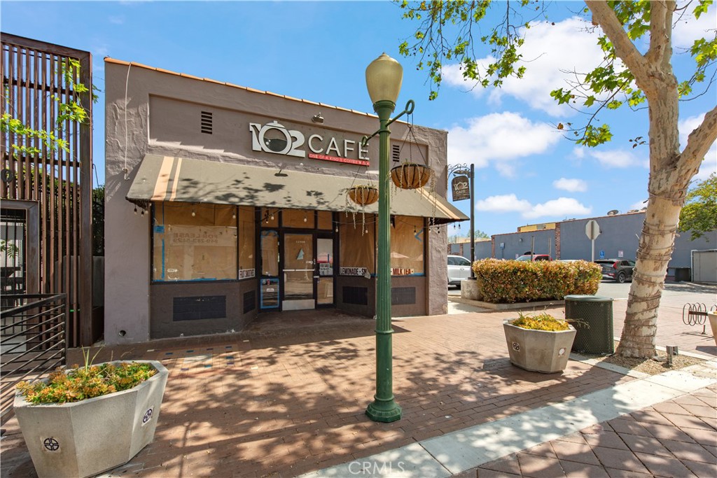 12908 Main Street Garden Grove, CA 92840 - Photo 3 of 18 a view of a building with sitting area