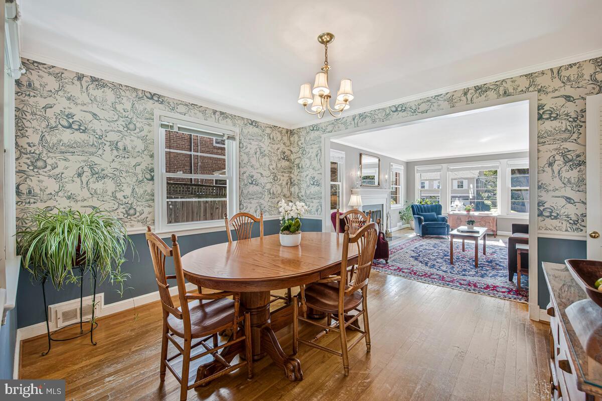 5811 Ridgefield Road Bethesda, MD 20816 - Photo 11 of 33 a view of a dining room with furniture window and wooden floor