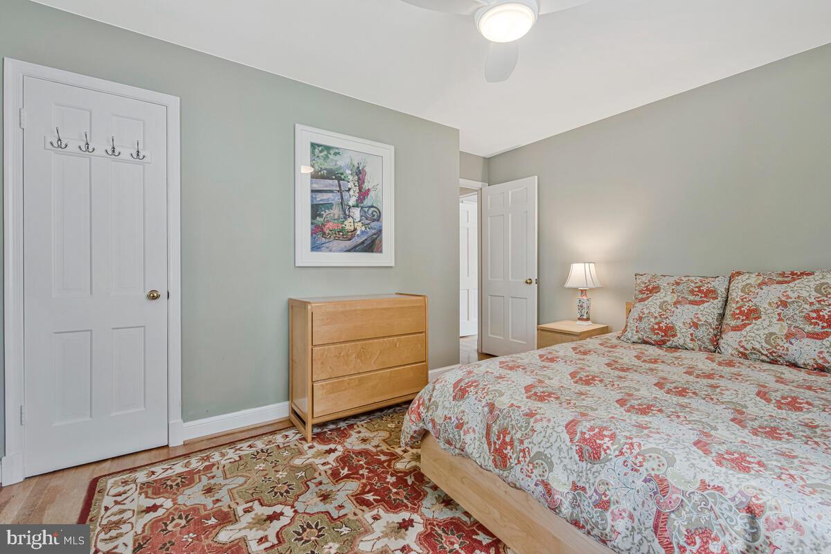 5811 Ridgefield Road Bethesda, MD 20816 - Photo 26 of 33 a bedroom with a bed and a window