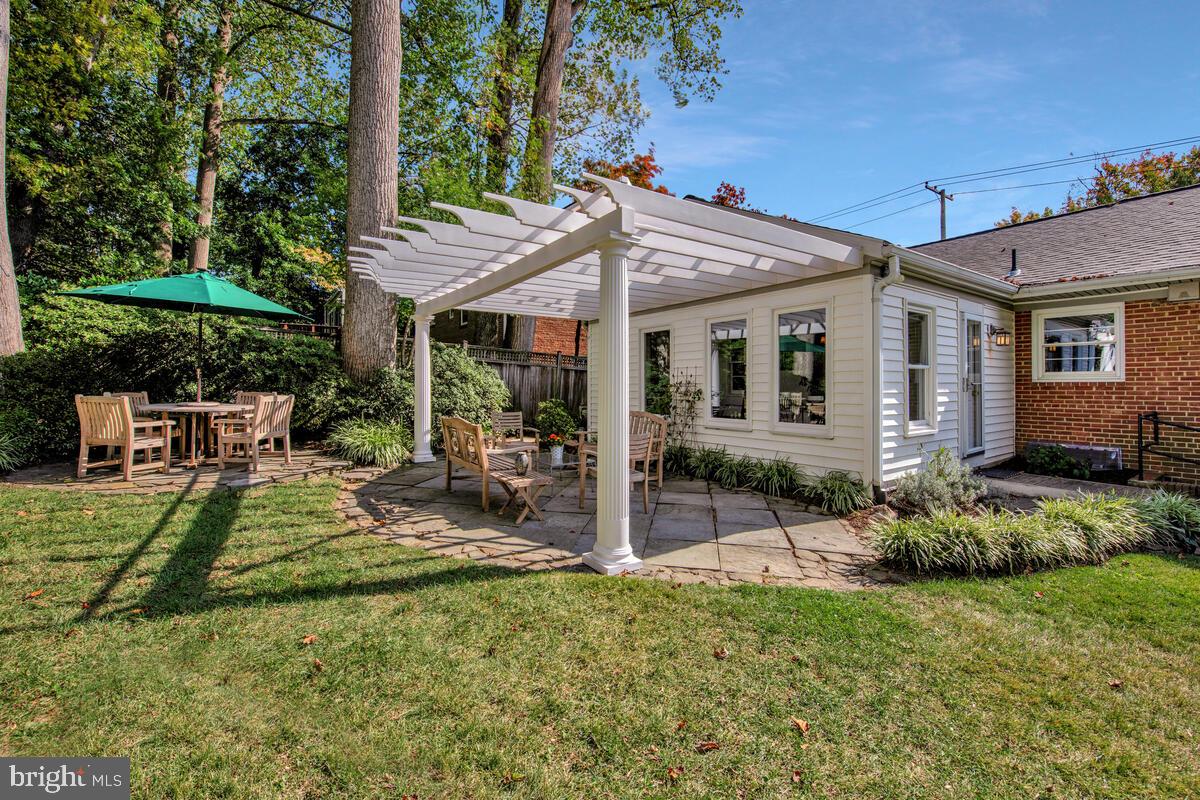 5811 Ridgefield Road Bethesda, MD 20816 - Photo 33 of 33 a view of a house with backyard and sitting area