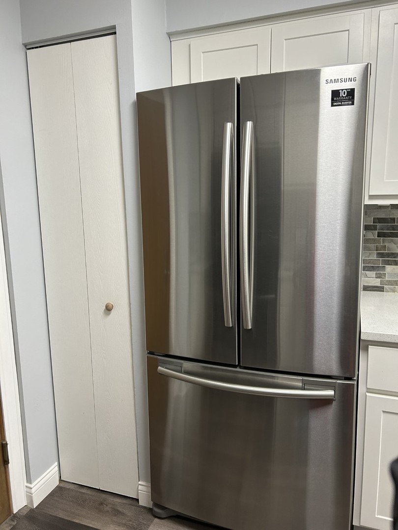 10440 Ridgeland Avenue, Unit 5 Chicago Ridge, IL 60415 - Photo 11 of 22 a view of a refrigerator in kitchen