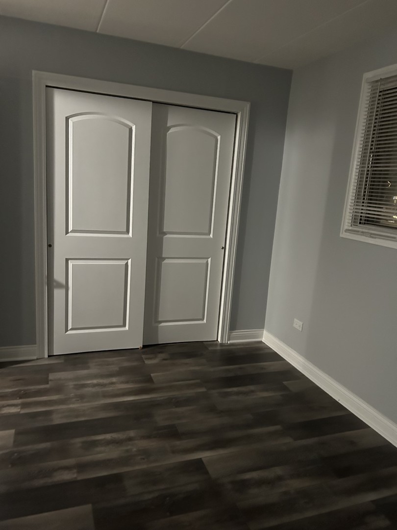 10440 Ridgeland Avenue, Unit 5 Chicago Ridge, IL 60415 - Photo 2 of 22 a view of wooden floor