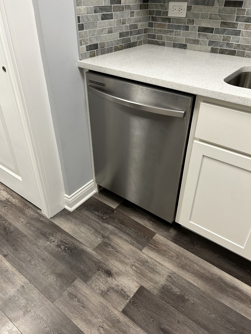 10440 Ridgeland Avenue, Unit 5 Chicago Ridge, IL 60415 - Photo 10 of 22 a view of a kitchen counter space and a sink