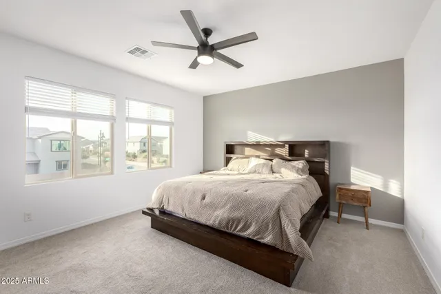a kitchen with stainless steel appliances granite countertop a sink a stove and cabinets