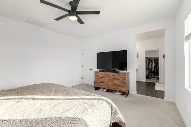 a kitchen with stainless steel appliances granite countertop a sink a stove and cabinets