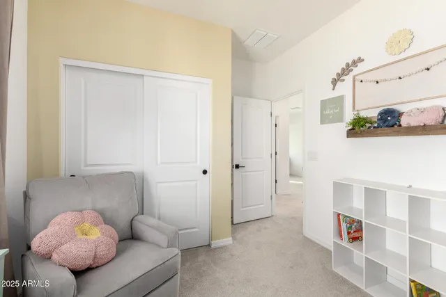 a bathroom with double vanity sink and mirror