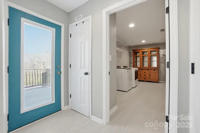 a view of entryway with livingroom