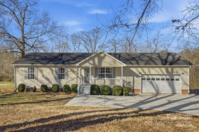 a view of a large house with a outdoor space