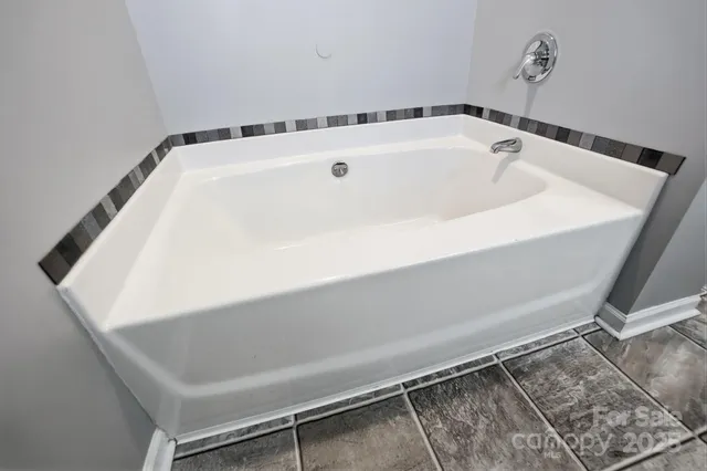 a bathroom with a bathtub