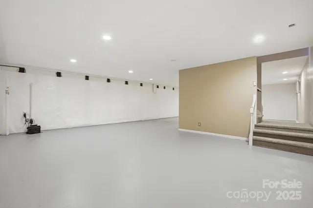 an empty room with a bench