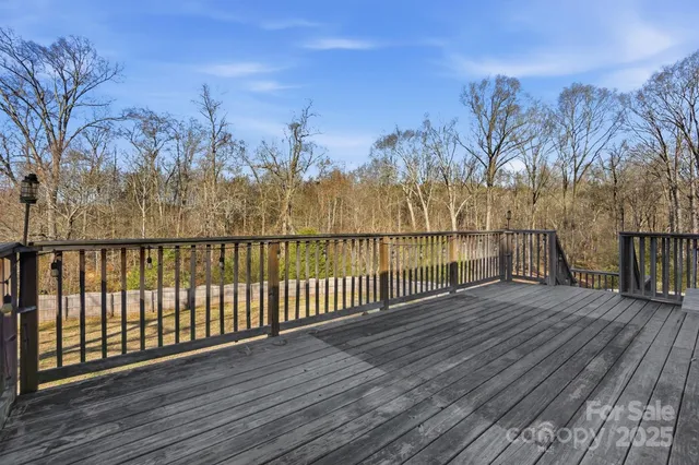 a backyard of a house with wooden floor