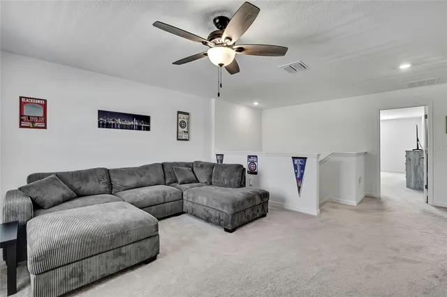 a bedroom with a bed and a table in it