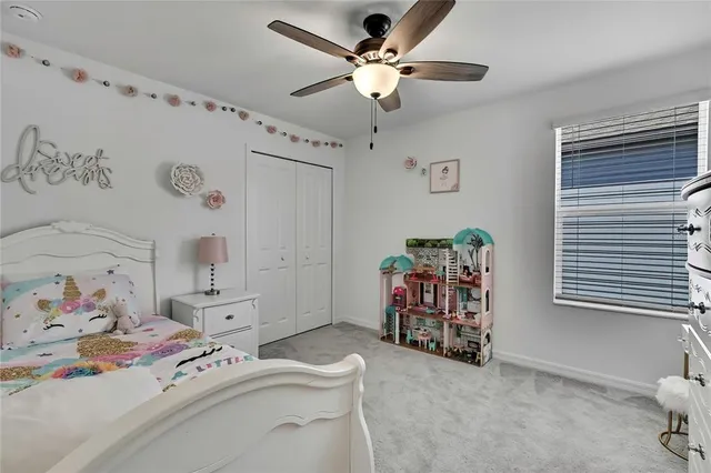 a view of swimming pool with a patio