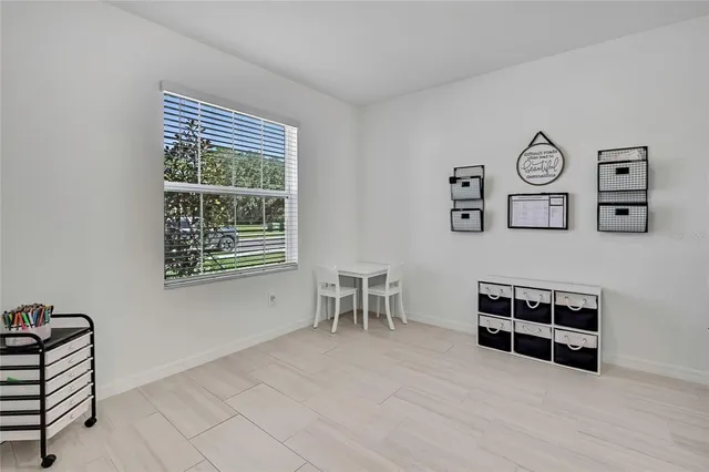 a kitchen with stainless steel appliances granite countertop a sink and a stove