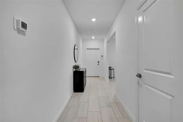 a kitchen with a sink stainless steel appliances and cabinets