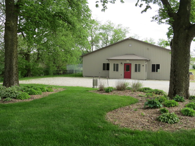 15661 West Peotone Road Wilmington, IL 60481 - Photo 15 of 21 a house that is sitting in the grass
