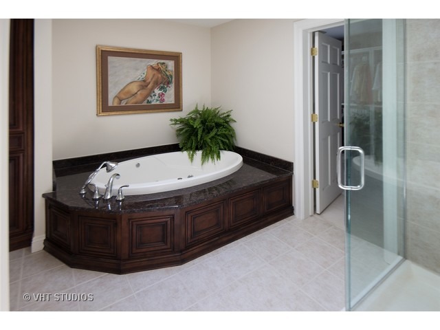 15661 West Peotone Road Wilmington, IL 60481 - Photo 9 of 21 a room with a bed and a painting on the wall