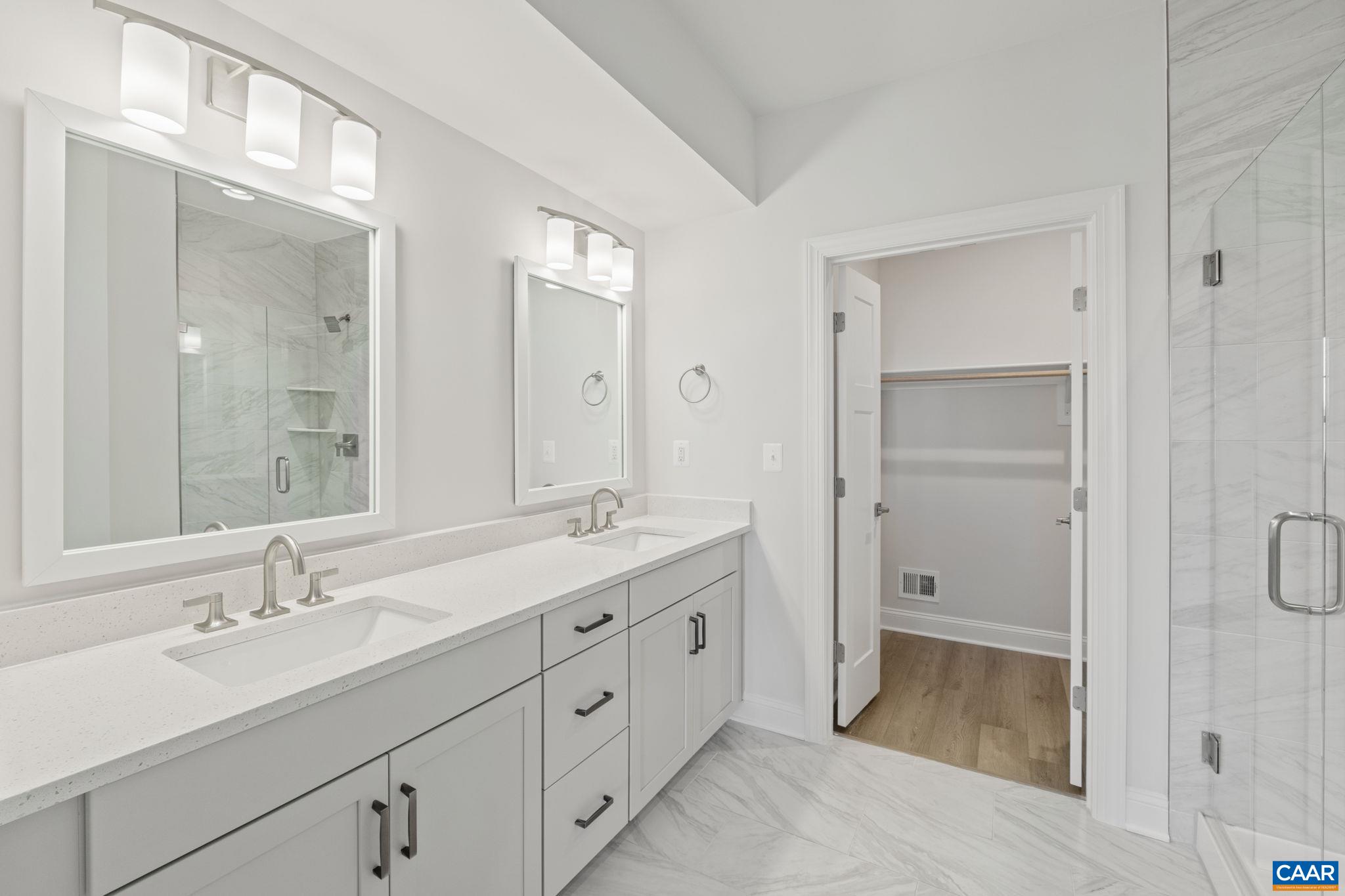 204 Marcella Street Charlottesville, VA 22911 - Photo 22 of 54 a bathroom with a double vanity sink mirror and double
