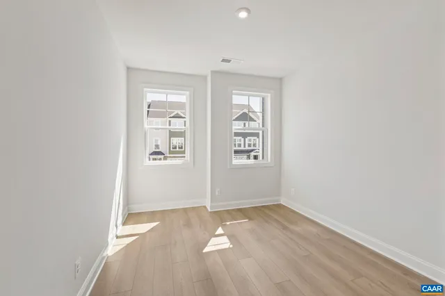 a view of a room with shelf on the wall