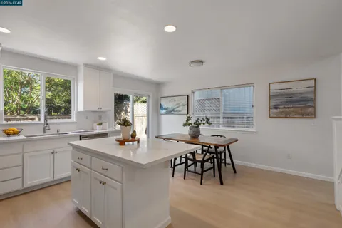 a view of a kitchen area with furniture and window
