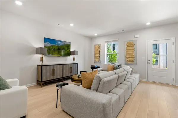 a living room with furniture and a couch